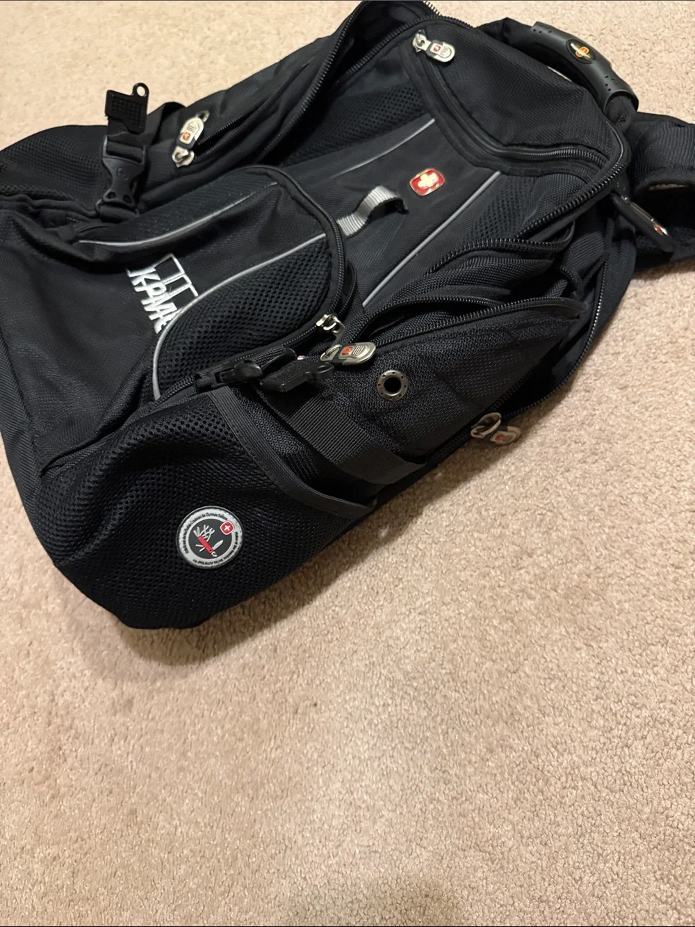 SwissGear Black Backpack with KPMG Logo